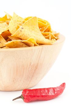 Pimento next to a bowl of crisps against white background 