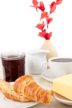 Table presentation for a breakfast against white background