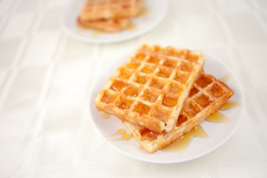 Waffles in a plate on a table