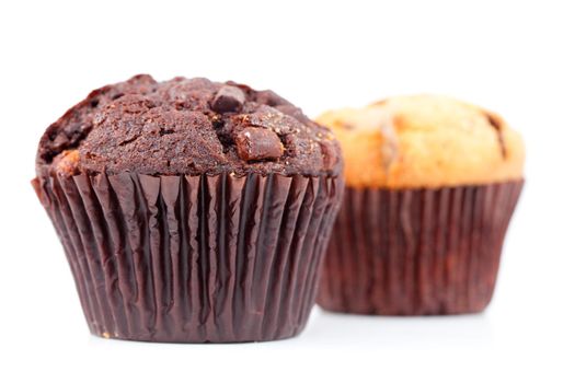 Fresh baked muffins side by side against a white background
