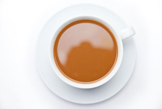 Cup of white coffee against white background