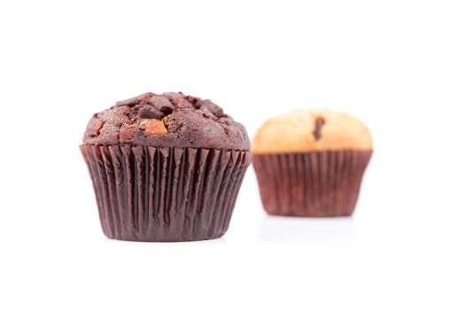 Fresh baked muffins against a white background