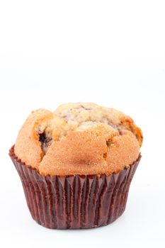 Close up of a baked muffin against a white background