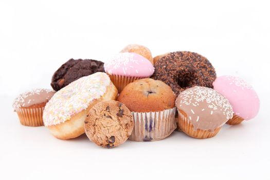 Cakes laid out together against a white background