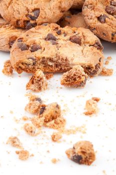 Close up of cookies piled up together against a white background