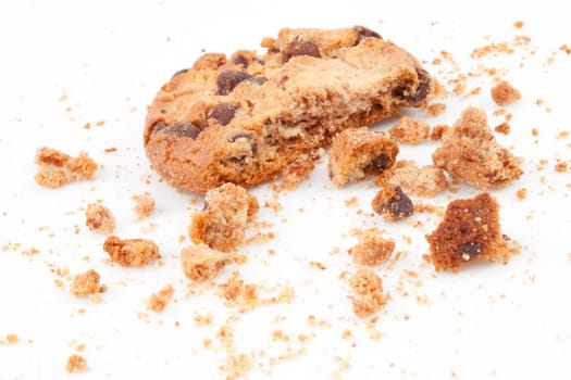 Cookie with a big part missing against a white background
