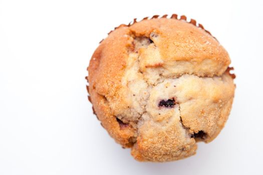 Close up of a muffin against a white background