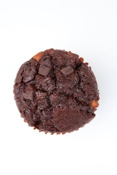 Extreme close up of a chocolate muffin against a white background
