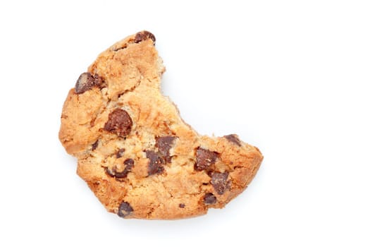 Close up of a cookie with a big part missing against a white background