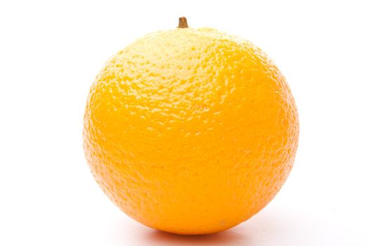 One orange against white background