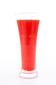 Glass of berries juice against white background