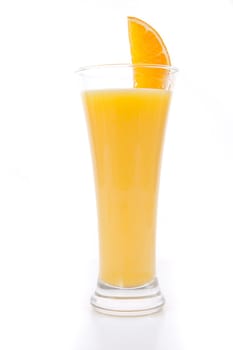 Orange slice on a full glass against white background