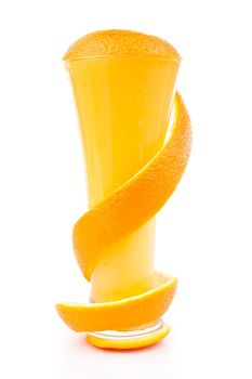 Orange peel surrounded around a glass against white background