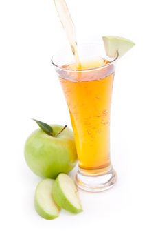 Apple juice against a white background