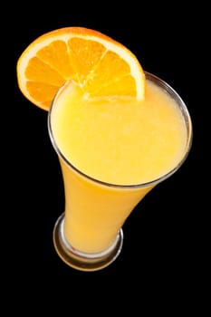 Orange  juice fresh against a black background