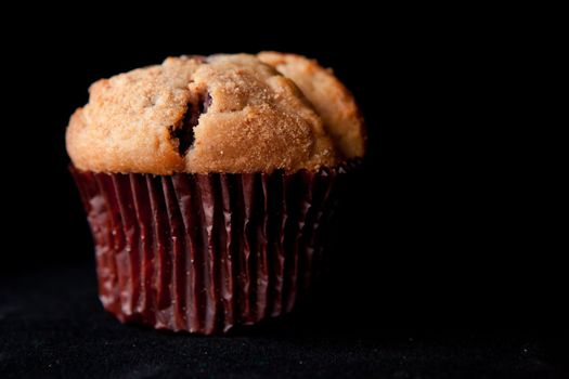 Muffin against a black background