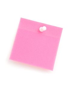 Close up of a pink adhesive note with pushpin against a white background