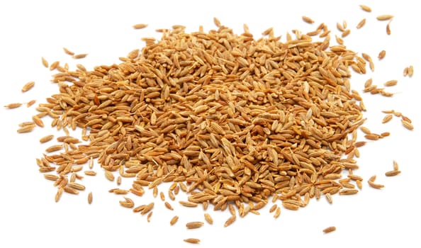 Whole cumin seeds, isolated on a white background