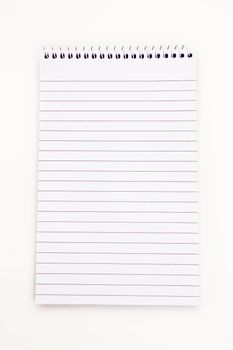 Empty notepad  sheet  against white background