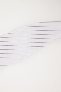 Paper blank tearing against a white background