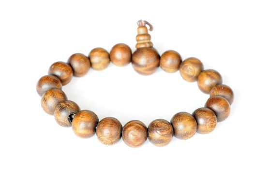 Wooden buddhist beads on a white background
