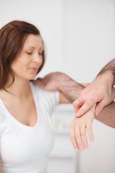 Peaceful patient being examined by a doctor in a room