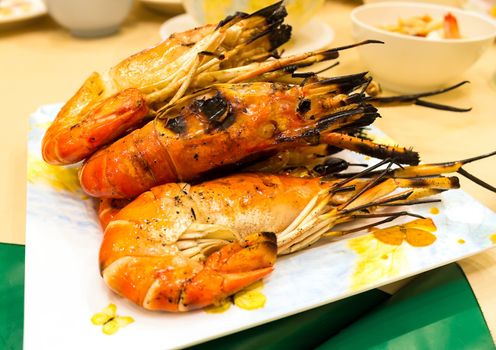 Grilled shrimps on plate ready to eat.