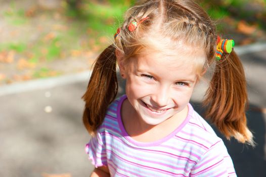 Portrait of a lovely smiling little girl