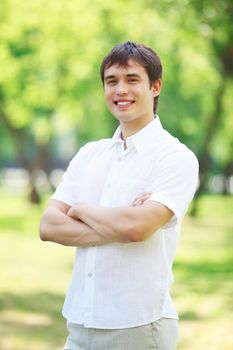 Handsome young man in the park. Outdoor portrait