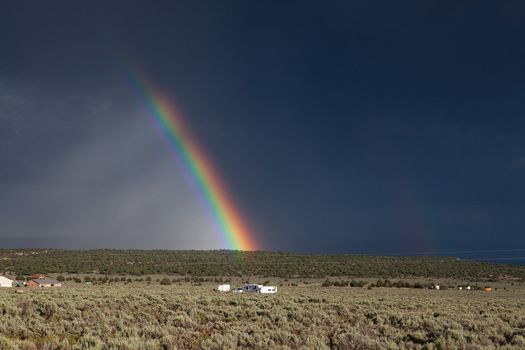 The rainbow before big storm in Arizona desert