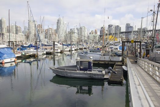 Boats Moorage in Harbor under Granville Island Bridge in Vancouver BC Canada