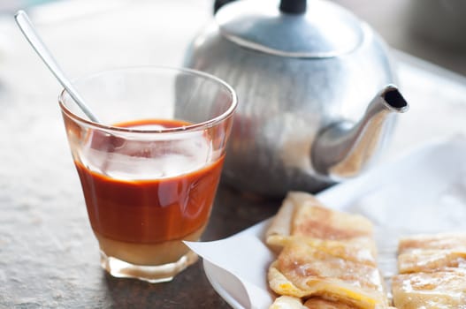 thai hot tea with sweet milk beverage