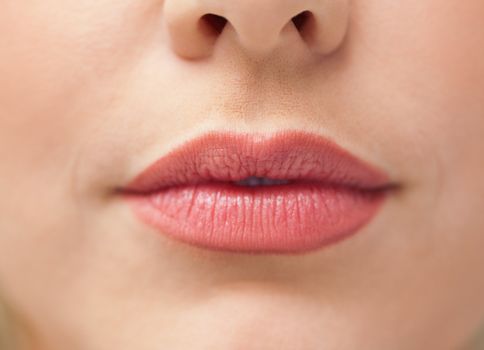 Close-up of lips with lipstick on them on a face