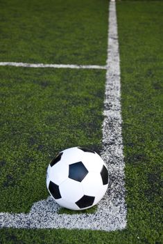 ball on corner line of artificial grass football field