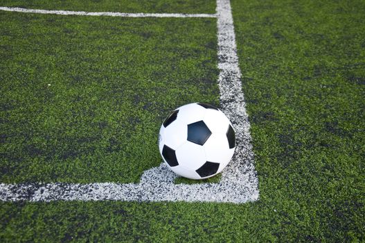 ball on corner line of artificial grass  indoor football field