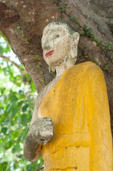 abandoned broken buddhism statue