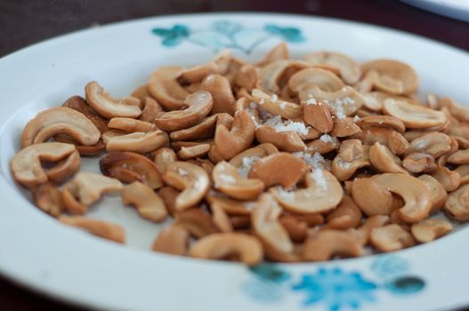 cashew nuts with salt on dish