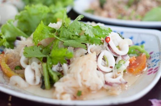 spicy squid salad with vegetable and chilli