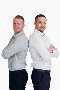 Two men standing back to back against a white background
