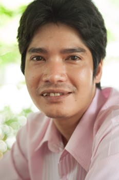 smiling asian man portrait