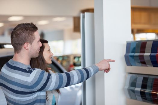 Clients watching different colours in a store