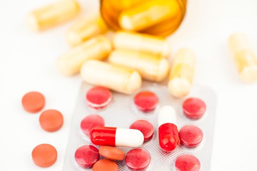 Close up of medications dispersed against white background