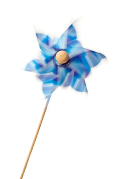 Pinwheel in motion against a white background