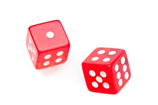 Two red dices moving agaisnt a white background