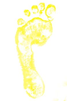 One yellow footprint against a white background