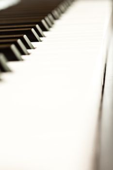 Close up of black and white keys of a piano