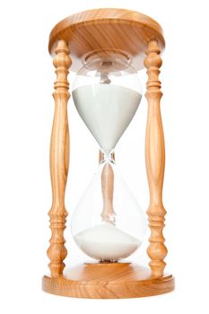 Sand flowed of hourglass against a white background