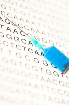 Syringe put on dna test writing in capital letters