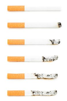 Different cigarettes burning against a white background