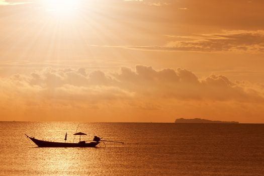 a boat with sunset